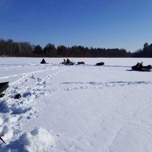 Ice fishing with snowmobiles